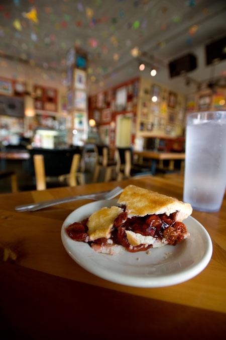 A slice of pie sits on a restaurant table